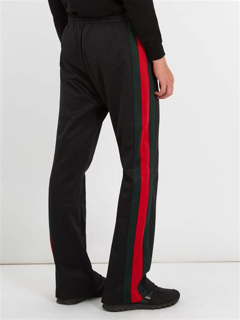 gucci men's black racer-stripe wool trousers|farfetch gucci trousers.